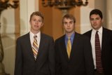 Three Suited Men Posed Together
