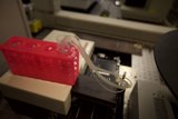 Red Box with Plastic Tube