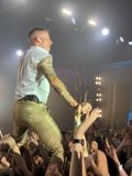 Tattooed Performer Rocks the Crowd