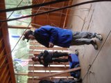 Blue Jacketed Carpenter at Work