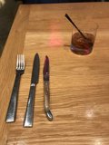 A Wooden Table Set for Dinner