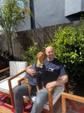 Man and Dog on the Backyard Chair