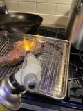 Grilled Mutton Steak on a BBQ Grill