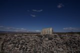 Stone Wall and Building