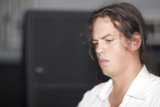 Long-Haired Man on the Couch