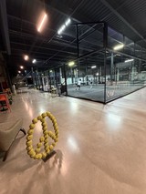 Modern Indoor Padel Tennis Court at Night
