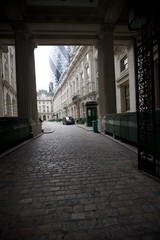 Gateway to London's Financial District Through Classical Archway