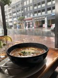 Delicious Meal with Soup and Plate of Food