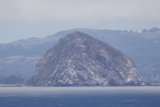 Majestic Morro Rock Amidst Misty Waters