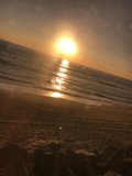 Sunset Reflections by the Ocean