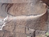 Ancient Carvings on a Slate Rock