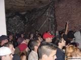 Night Club Crowd with Baseball Caps