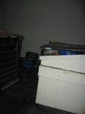 White Box with Blue Lid on Wooden Floor