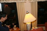 Blue Sweater Man in a Well-Lit Room