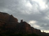 Majestic Red Rocks under Cloudy Sky
