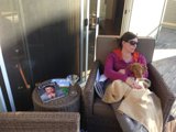 Woman Relaxing in Stylish Chair with Sunglasses On