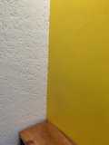 Vibrant Yellow Plywood Wall