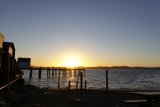 Serene Sunset at the Waterfront Pier