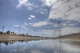 Towering Power Lines Across the River