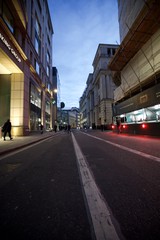 Evening Rush Hour on London's Financial District Street
