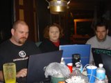Grey Shirted Man Working On Laptop
