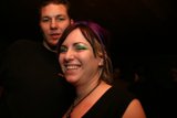 Smiling Couple at Urban Nightclub Party
