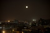 A Celestial Night Scene Over the Metropolis
