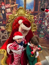 Santa's Workshop Visit with Two Young Children