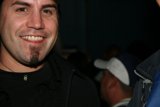 Black Shirted Man with Baseball Cap