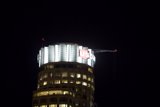 Metropolis Tower glowing in the Night Sky