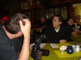 Snapshot of a Photographer at a Pub