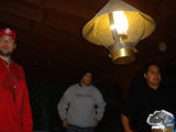 Red Shirted Man under Lamp Light