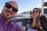 Couple Enjoying Waterfront Dining at Marina