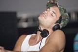 Grooving with Headphones and Hat