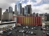 Cityscape with Busy Parking Lot