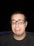 A Happy Man with Glasses