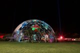 Illuminated Sphere Dome in the Night Sky