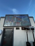 E-Scooter Advertisement on Urban Mural