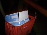 Red Shopping Cart of Papers
