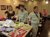 Friends Gather Around a Festive Holiday Dinner Spread