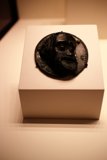 Bronze Face Figurine on Wood Plaque