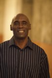 Happy Bald Man in Stripe Shirt