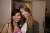 Two lovely ladies and a beautiful floral display