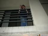 Hands Up on the Balcony