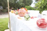 Citrus and Flowers on a Table