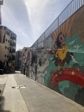 Colorful Cartoon Mural Brightens Up City Wall