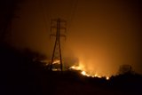Flames Threaten Power Lines