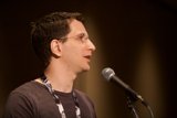 Jeff M. Speaking into the Microphone at Defcon 17