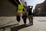 Mayday Rally Protestors on Sidewalk