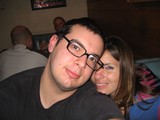 Friends Posing Close Together at a Casual Bar